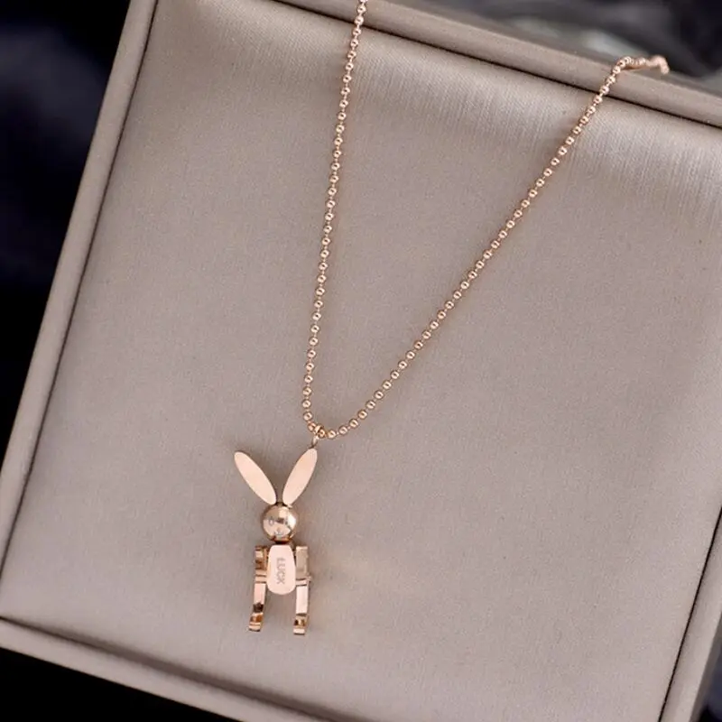 

Модный мобильный Кролик ожерелье из желтого золота с Цвет 316L Titanium стали ювелирные изделия подарок женщине никогда не увядает гипоаллергенн...