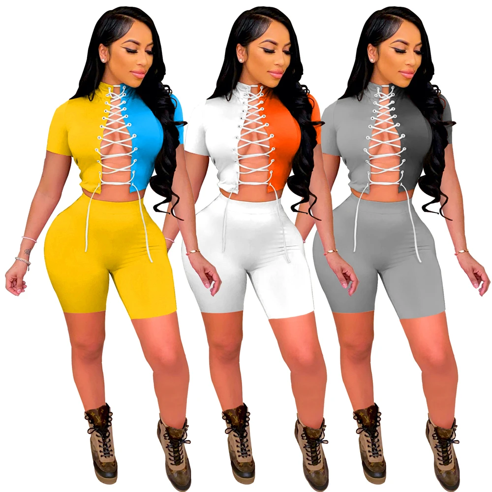 

[w8178] European and American women's summer color contrast short sleeve suit high elastic fabric sexy lace up two piece set who