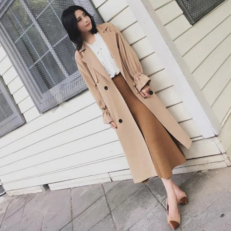 

Dust coat women cultivate morality of new fund of autumn double-breasted long dress in loose long-sleeved pure color trench coat