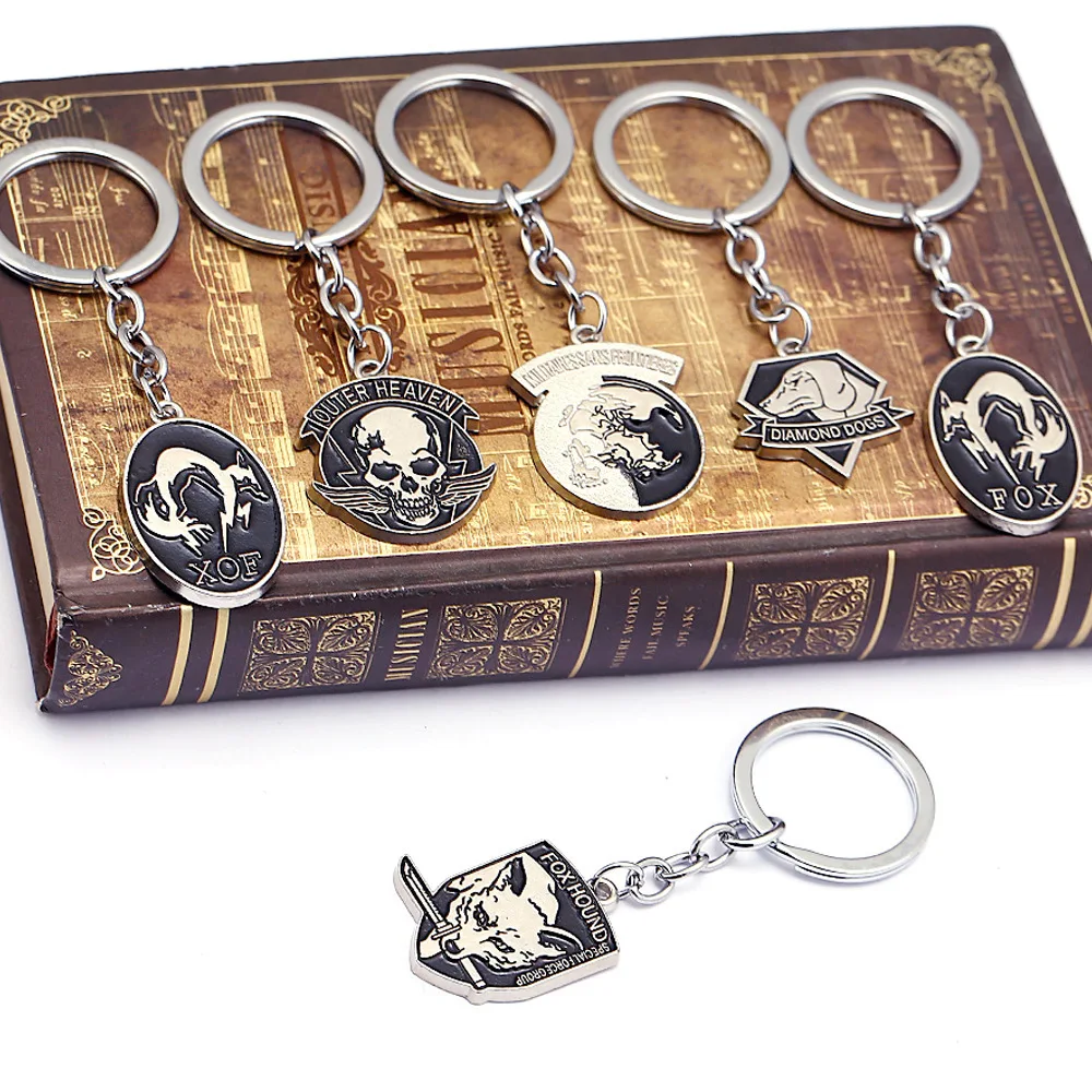 

Game Metal Gear Solid 5 Keychains Fox Hound Outer Heaven llaveros Metal Pendant Keyring Car Key Chain Skull Animal Souvenir Gift