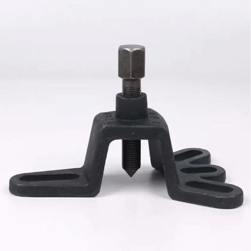 Устройство для снятия задней оси с тормозным барабаном трехколесного велосипеда для ремонта мотоциклов.