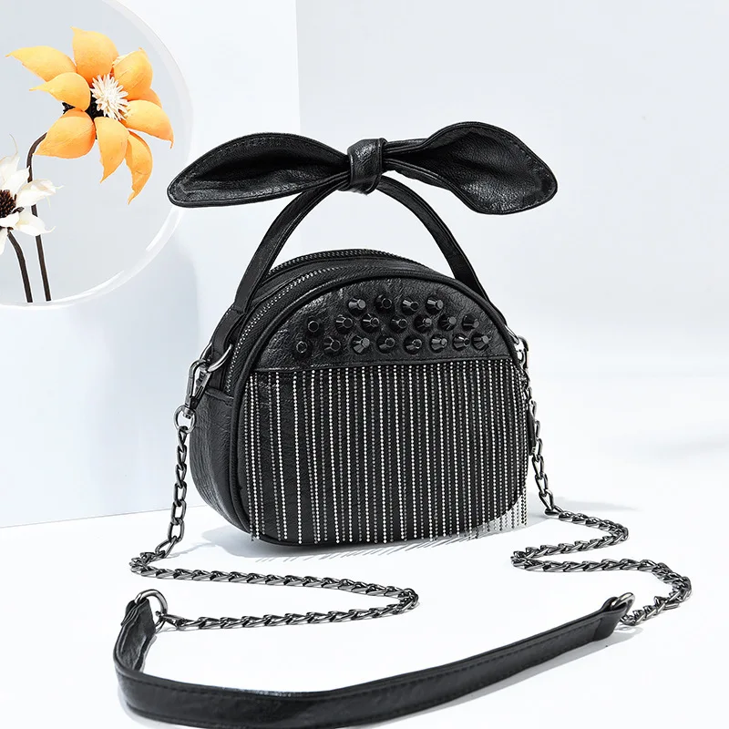 

European style 2021 New Women's Round One Shoulder Slanting Purse Fashion Designer Luxury Pu Cosmetic Handbag Free Delivery