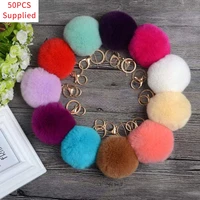 50pcs hot sale trinket fluffy artificial rabbit fur ball key chain pompons keychain women car bag key ring jewelry supplied