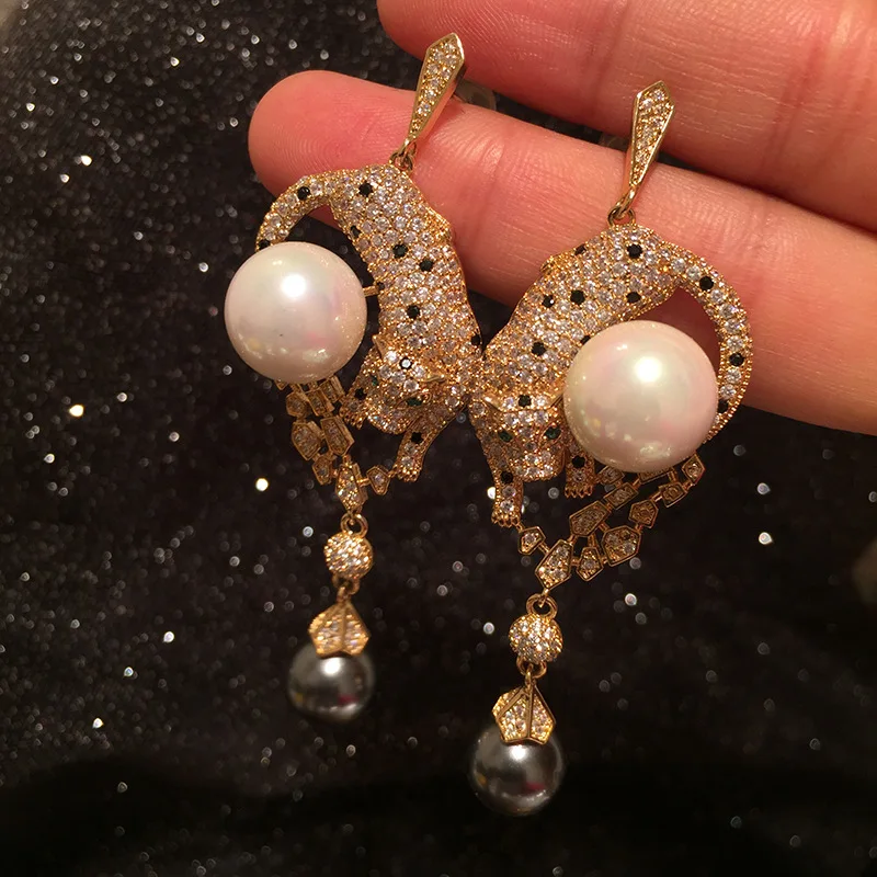 

Korea creative animal leopard pearl tassel earrings exaggerated atmosphere luxury earrings elegant temperament S925
