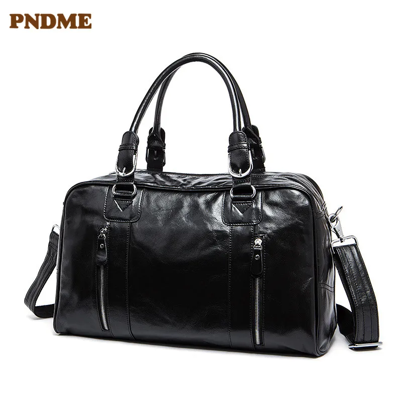 PNDME black genuine leather men's women's travel bag fashion simple high quality cowhide handbag luggage bag casual duffel bag