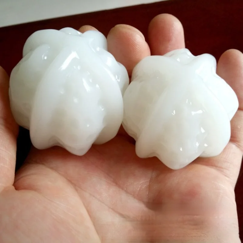 

Xinjiang Seed Materials and Tianyu Baiyu Walnut Hand A Beautiful Stone Crafts Small Gift Can Massage Decorations