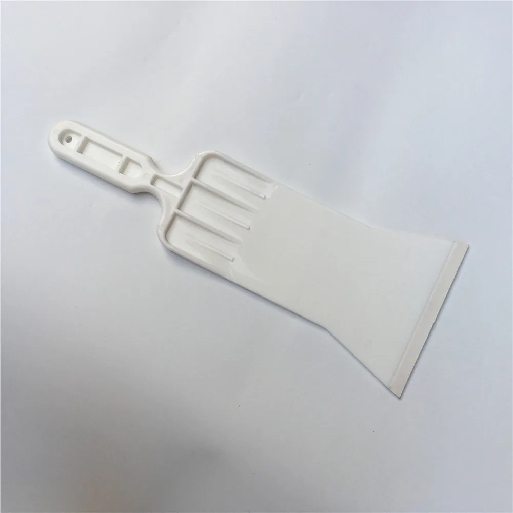 Скребок для оконных стекол чистым инструментом бульдозер водный