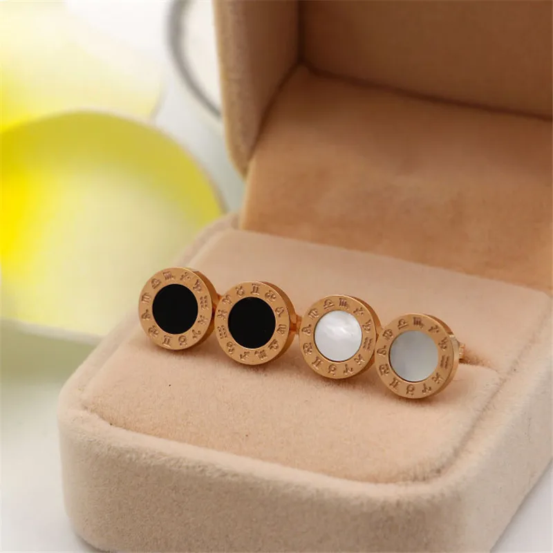 Серьги-гвоздики женские из нержавеющей стали с белой раковиной и черной эмалью |