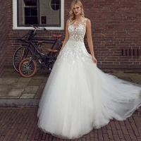 princess wedding dresses robe de marie 2021 vintage o neck sleeveless appliqued lace button court train bridal gowns