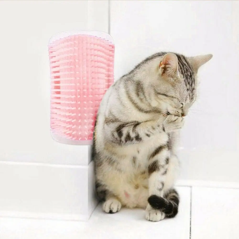 

Pet Products for Cats Brush Corner Cat Massage Self Groomer Comb Brush With Catnip Cat rubs the face with a tickling comb