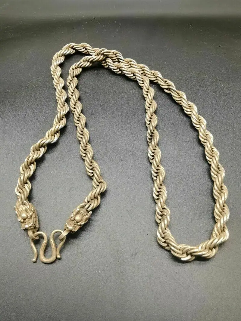 

Old Chinese tibet silver handcarved double dragon head necklace