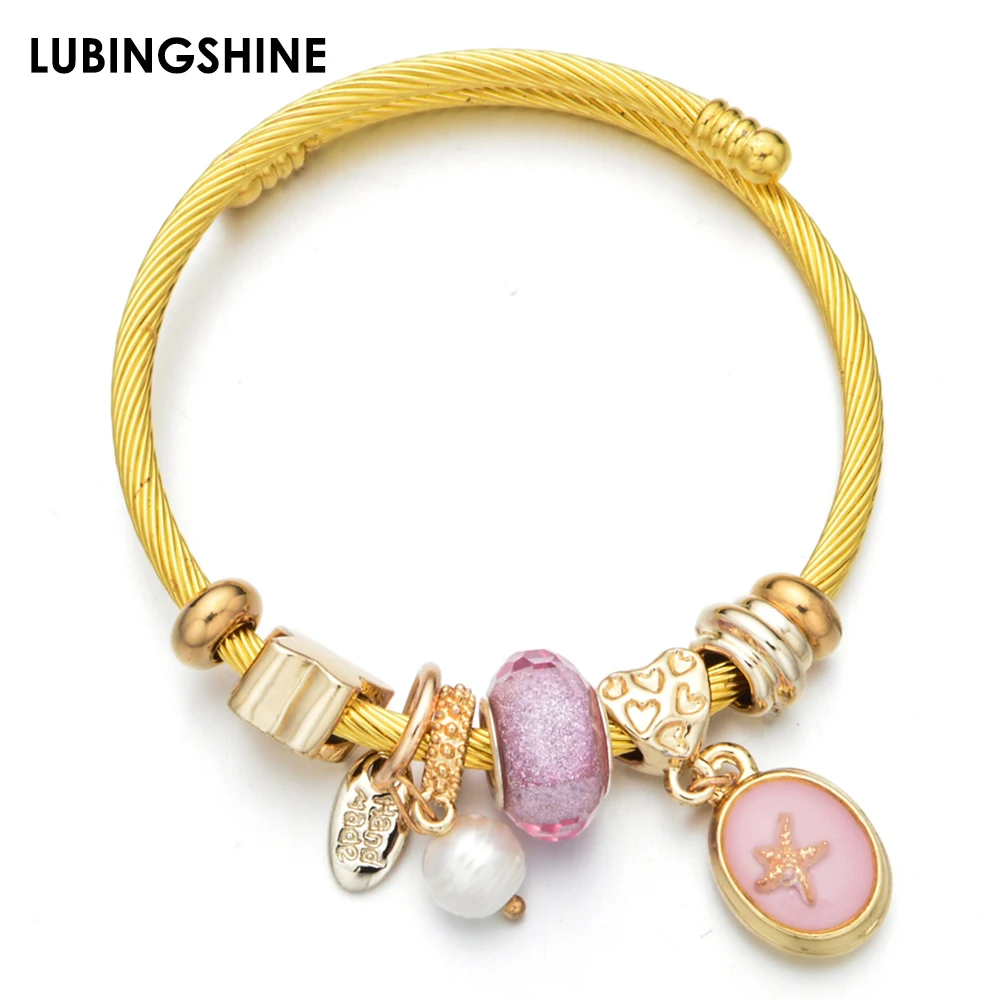 Изысканный браслет из керамических бусин и жемчуга нержавеющей стали золотого