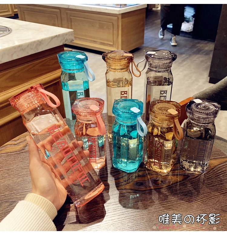 

Simple Plastic Summer Cute Water Bottles Portable Handle Creativity Fashion Items Botellas De Plastico Sports Items EC50SH
