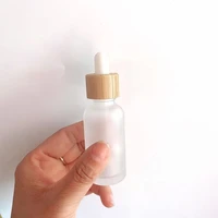 5ml10ml15ml30ml50ml empty frosted glass dropper bottles with bamboo lid glass essential oils bottle pipettes bottles