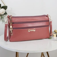 2020 new female bag oil wax leather womens single shoulder middle aged messenger multi layer large capacity cross body bag