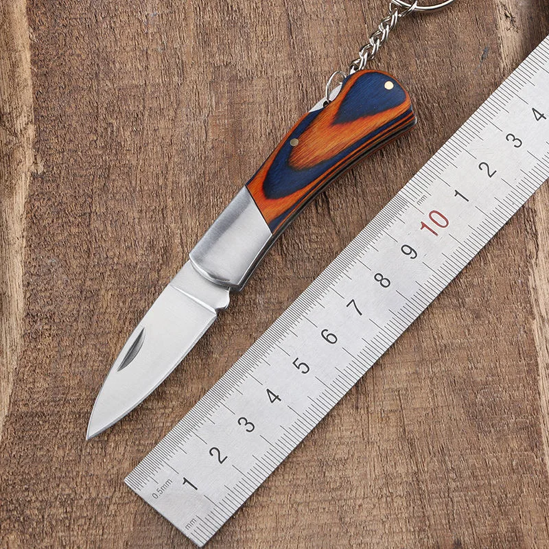

Portable Stainless steel mini folding knife ladies self-defense fruit knife keychain