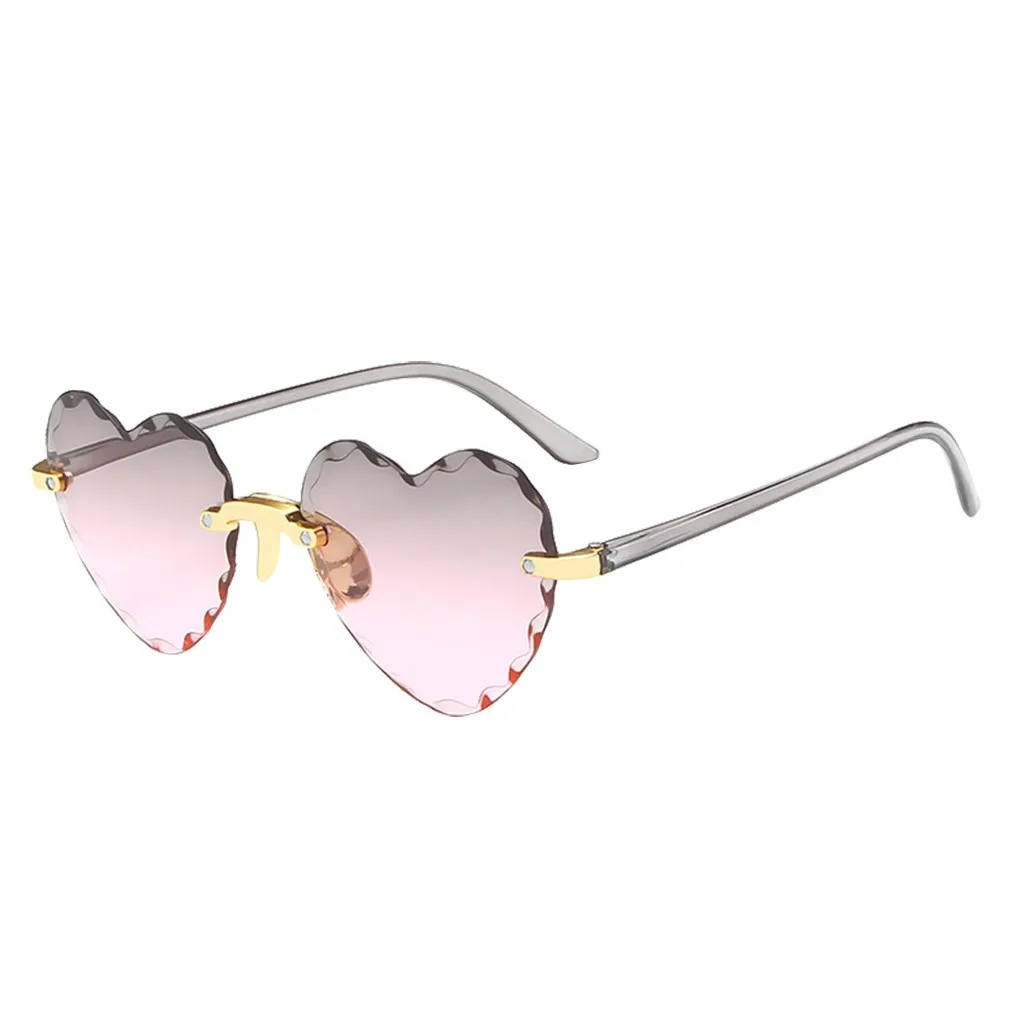 

New unisex glasses fashion trend love sunglasses transparent candy color casual heart-shaped rimless sunglasses glasses X*