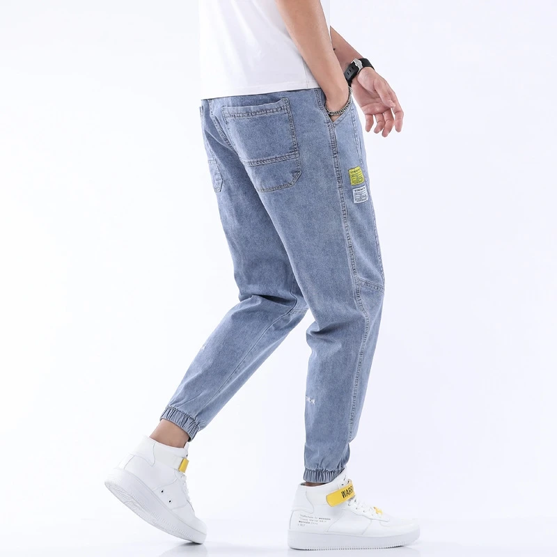 

Spring and summer new jeans men's pants fashion brand men's pants loose legged casual pants men's harem Capris
