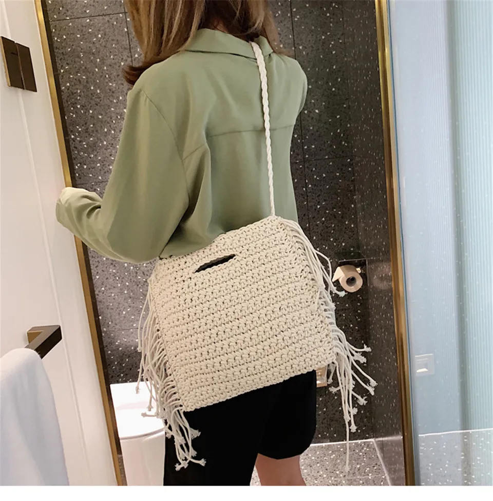 

Cotton Woven Hand Held Fringed Beach Straw Bag High Quality Designer Holiday Handbags for Women 2021