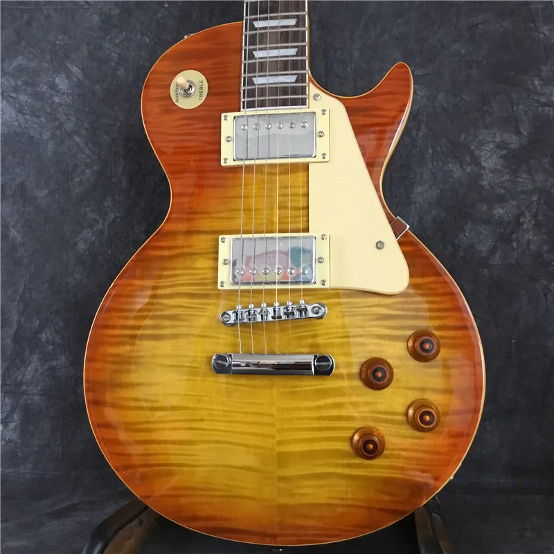 

Высококачественная дымчатый цвет электрогитара, top maple flame. Хорошее качество звука. Новый стиль
