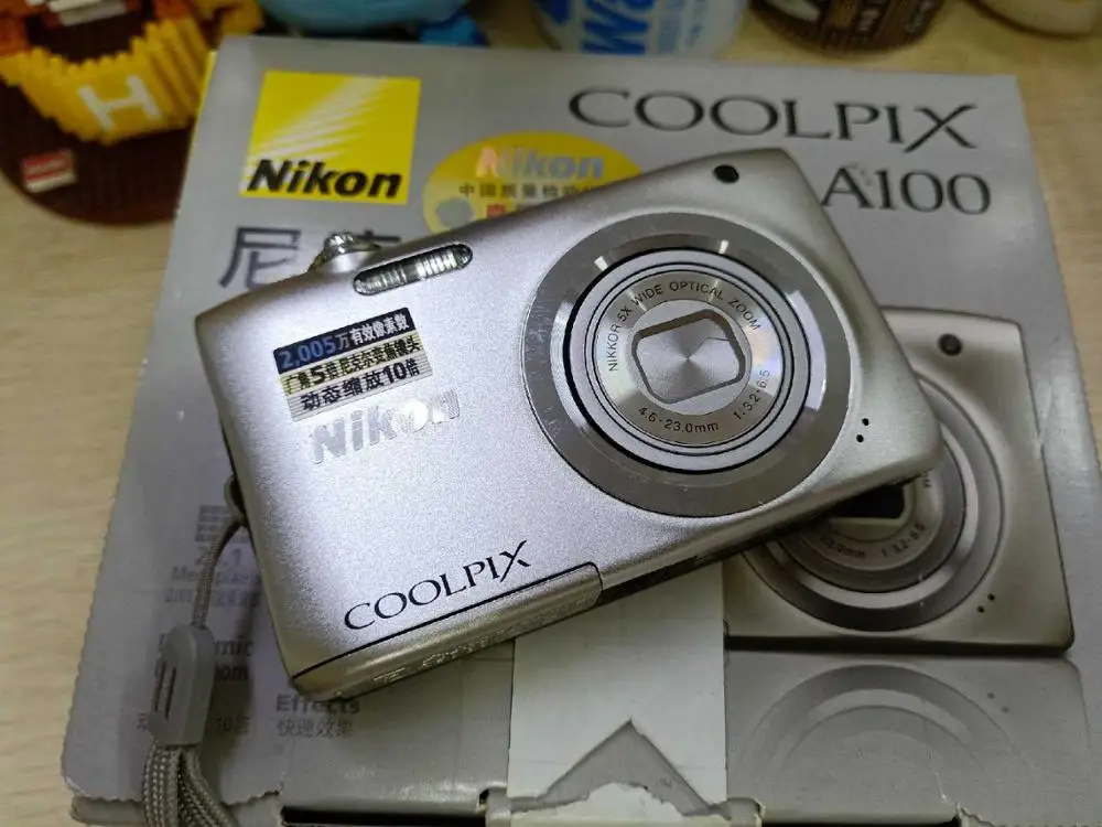 USED NIKON COOLPIX A100 digital camera CCD 5x optical zoom lens 26-130mm equivalent |