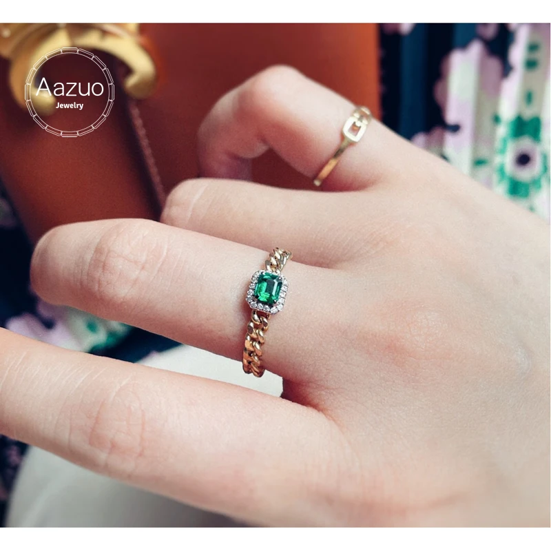 Женское кольцо из 18-каратного желтого золота с натуральными изумрудами |