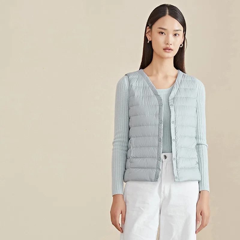 

Женский тонкий пуховик с V-образным вырезом, на пуговицах