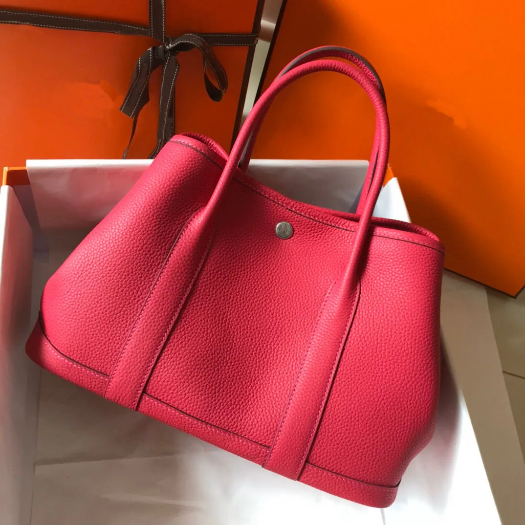

2021 Orange Top Leather Lady's Hand-Held Shopping Bag Single Solid Color Appearance Design Large Capacity Leisure Style