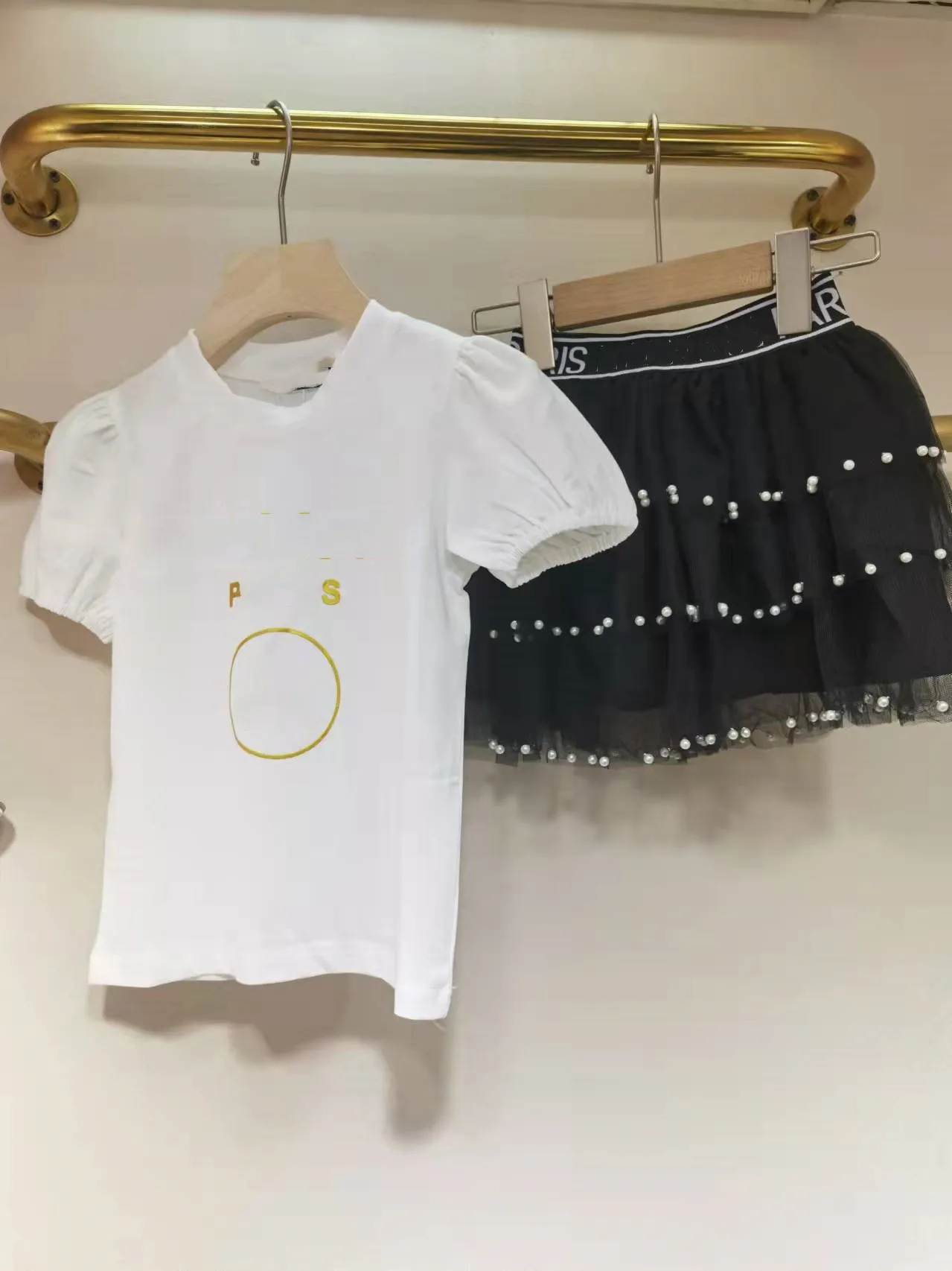 

free shipping Top Brand Designer Clothes For Kids Girls Sets letter Summer Short Sleeve T-shirt Children Top+Skirt 2Pcs