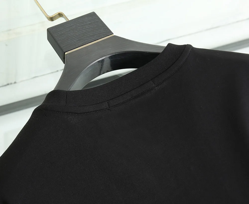

T-Shirt The new summer style men and women round collar short sleeve T-shirt trend couples shirt