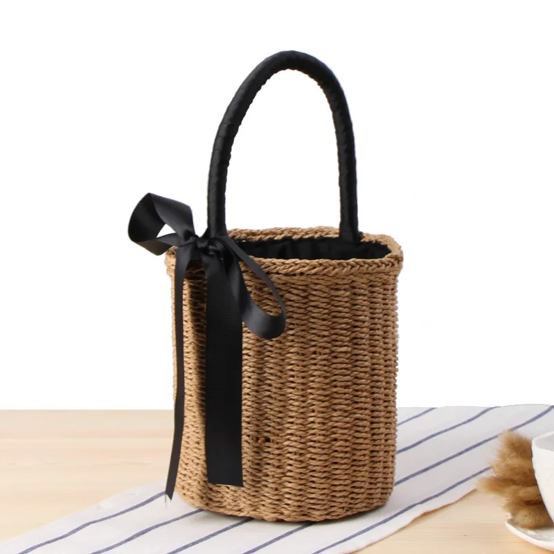 

2021 Summer New Ladies Hand Carry Straw Bag Tubular Summer Beach Vacation Woven Bag Tote Bucket Ribbon Leisure Bag