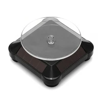 solar showcase 360 turntable rotating jewelry watch ring phone stand display organizer holder black white