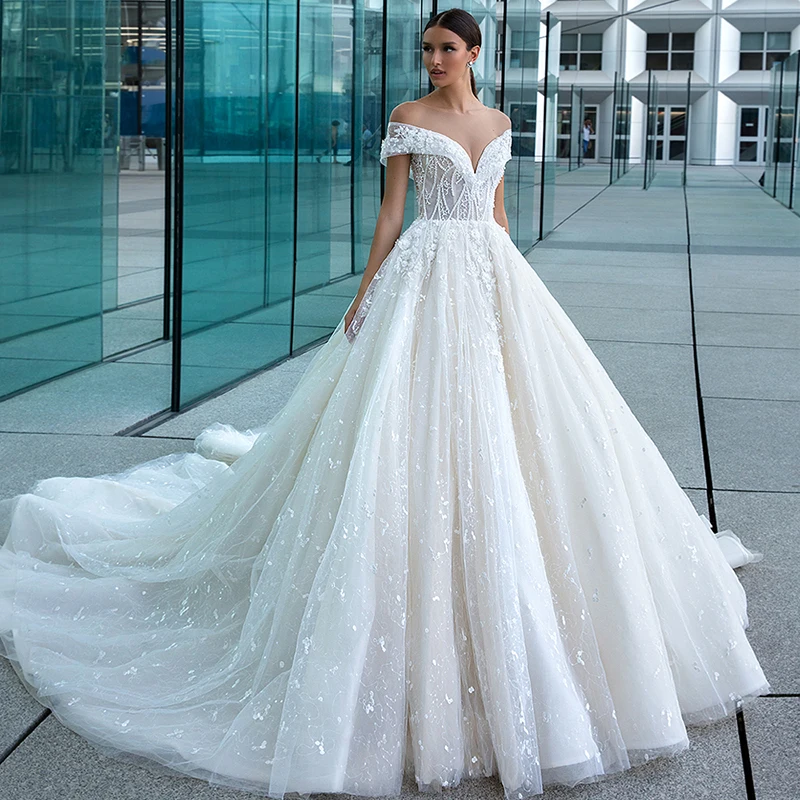 

Luxury Wedding Dresses Sleeveless O Neck Lace Applique Charming Gowns Sexy Backless Shiny Tulle Court Train Robe de mariée