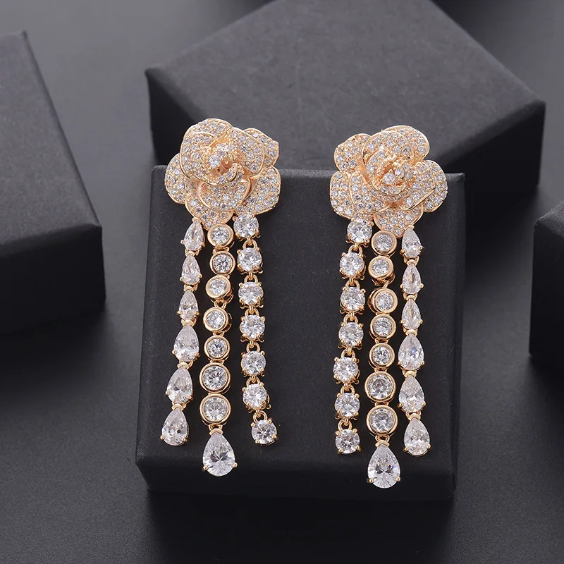 

Three-dimensional rose zircon earrings copper micro-inlaid tassel earrings camellia earrings female earrings big celebrity earri