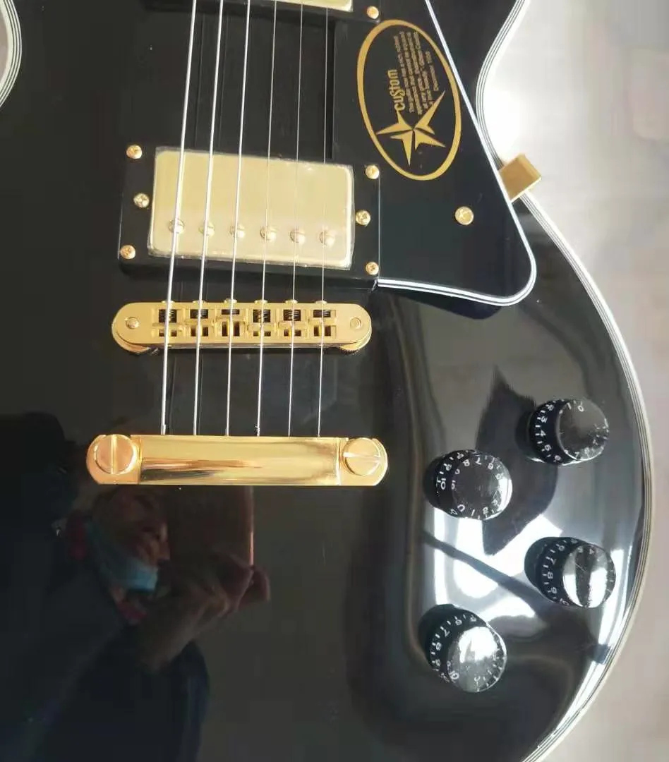 

Guitarra Elctrica personalizada de color negro, diapasn de palisandro, accesorios de encuadernacin, piezas doradas