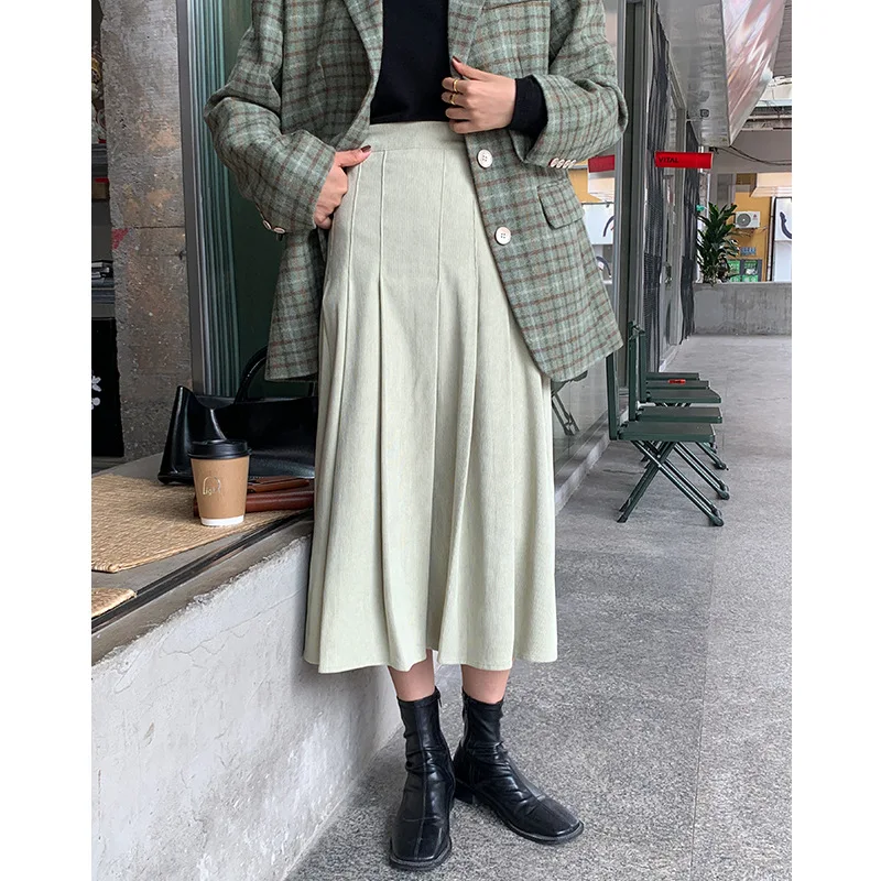 

CorduroyUmbrella skirt Women's clothingAutumn and winterNew style French styleRetro High waist thin style Mid-length loose