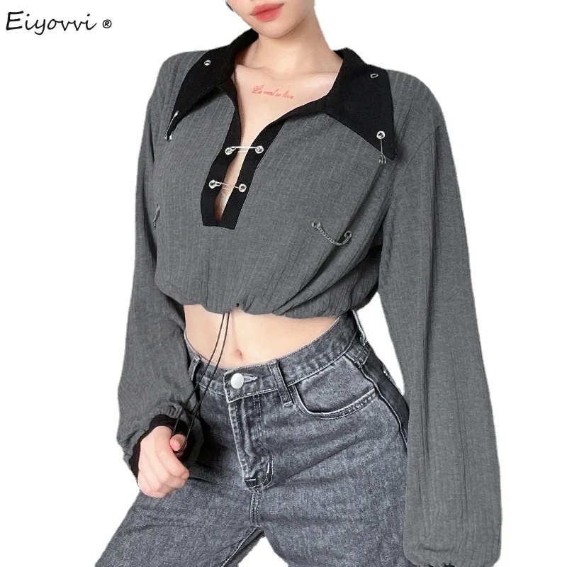 

Однотонная женская футболка со съемными металлическими пуговицами и кольцами, соблазнительные Топы с длинным рукавом и отворотом, открыты...