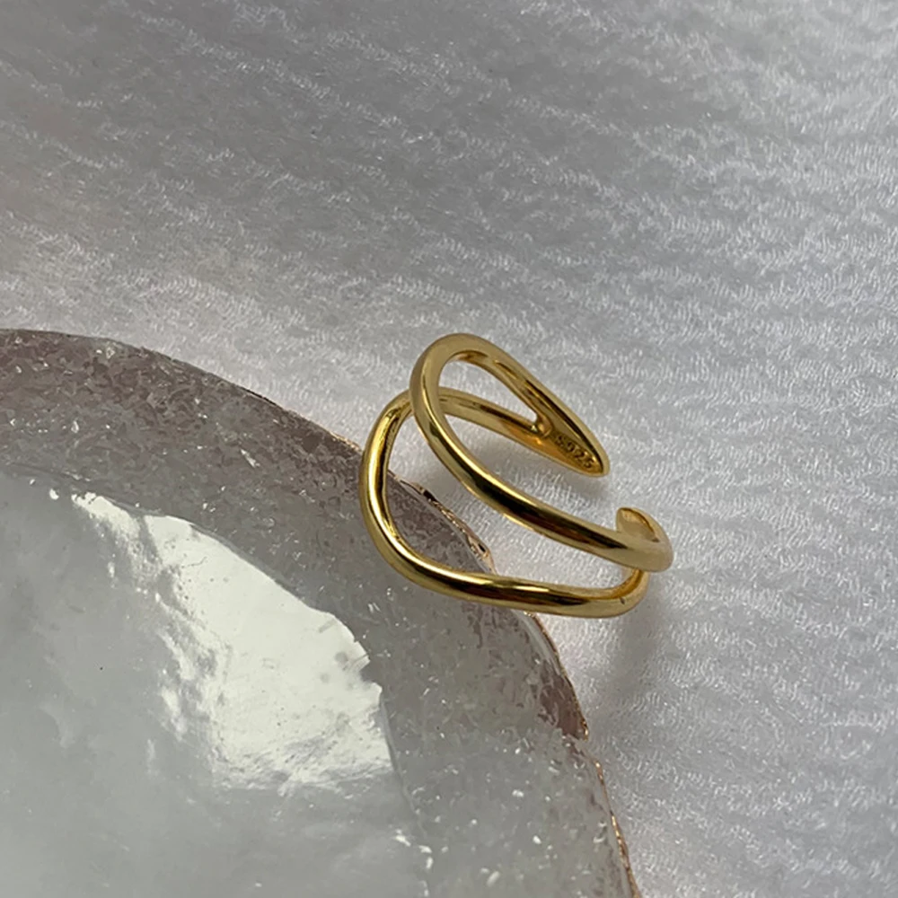 Женское Двухслойное кольцо с перфорацией золотистое круглое геометрическим