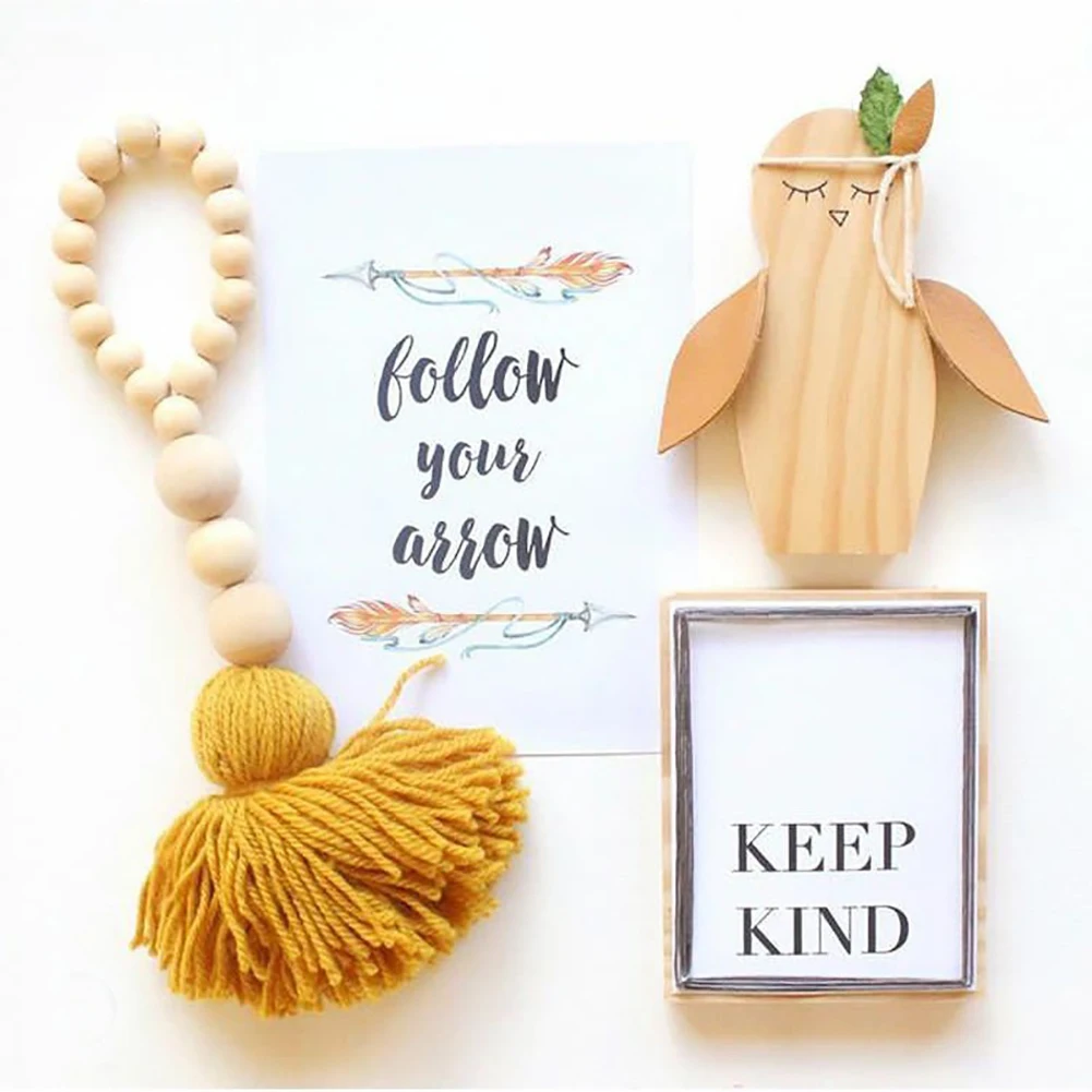 Скандинавские деревянные бусины с кисточками дизайн детской комнаты фото