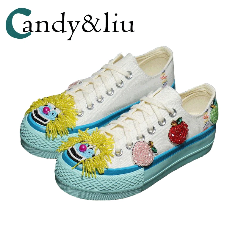 

Canvas shoes women's new European station heavy beaded clown platform joker low-cut casual shoes