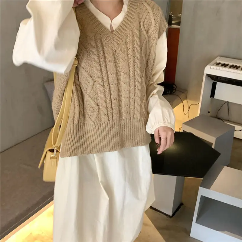 

Осенне-зимний Новый стильный свитер без рукавов с v-образным вырезом, женский корейский модный короткий свободный трикотажный топ в полоску...