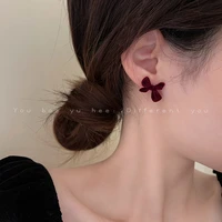 red butterfly earrings flocking bow stud earrings female korean temperament net red unique earrings