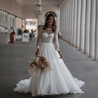 latest o neck a line corset top wedding gowns sheer long sleeve simple tulle africa wedding bride dress vestido de novia 2021