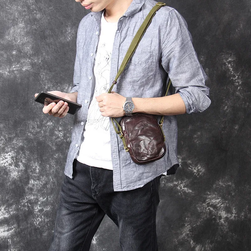 PNDME fashion vintage genuine leather men's small chest bag casual high quality soft cowhide mini messenger bag luxury phone bag