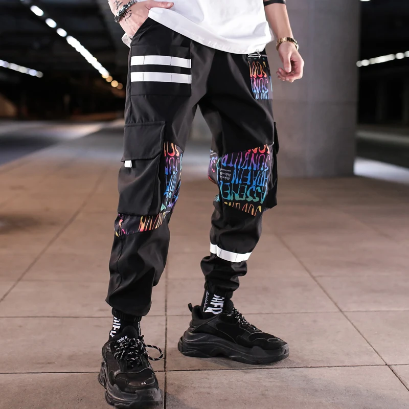 

Hip hop Pants Men Loose Joggers Spring Autumn New Side Stripe Panelled Patchwork Men Bottom-tied Sweatpants Harem Pants
