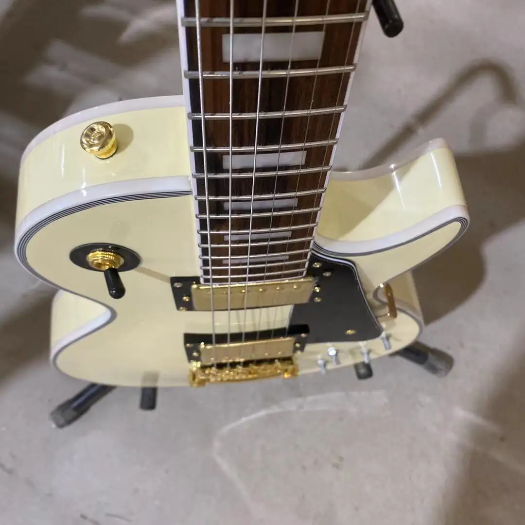

Custom Electric Guitar Cream Yellow Color Golden Hardware High Quality Free Shipping
