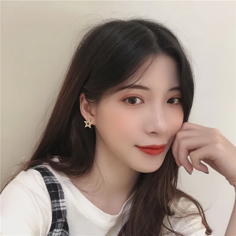 Fashion temperament contracted colorful hollow-out five-pointed star earring character joker earrings sell like hot cakes