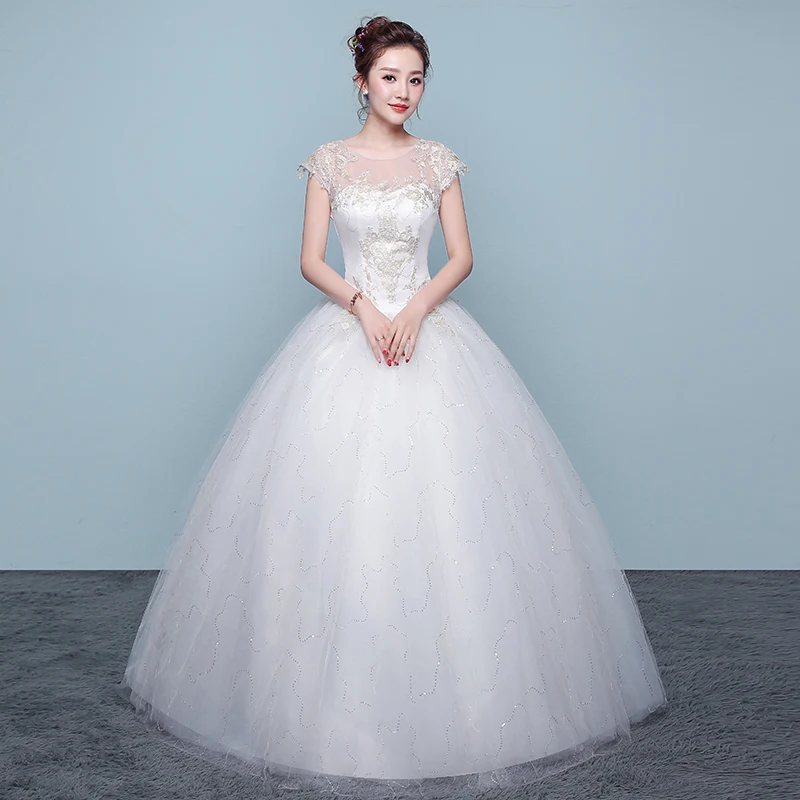 

Wedding Dresses Illusion O-Neck Short Sequined Embroidery Tulle Lace Backless Luxury White Floor-Length Women Bridal Gown FB668