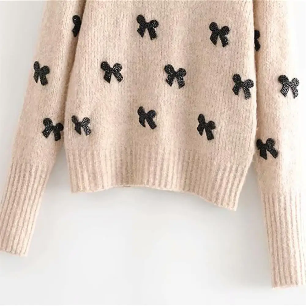 

Autumn 2019 women's new long sleeve round neck color contrast stitched bow and embroidered sweater. 03653109183