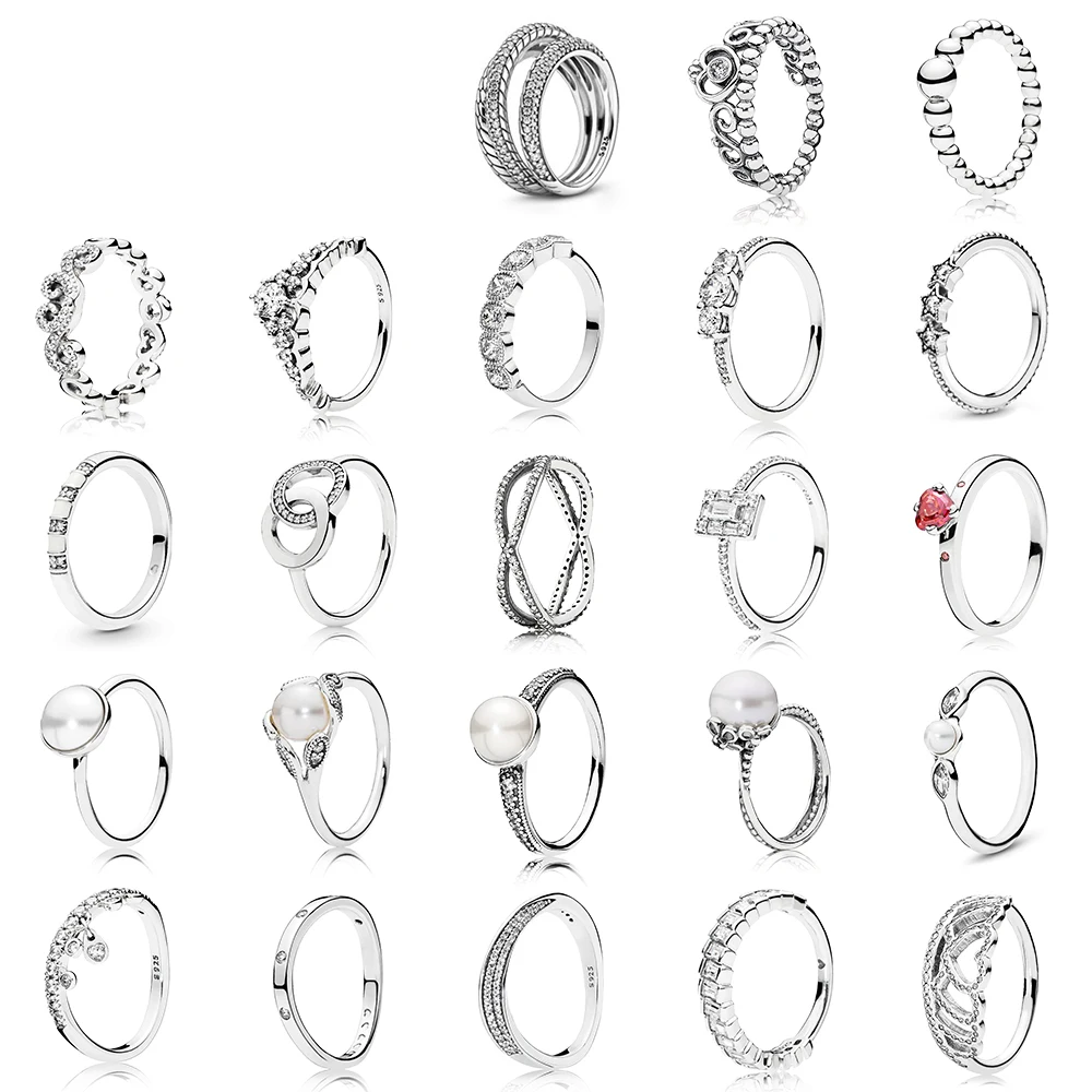 

Женское кольцо в виде короны из серебра 925 пробы с Луной и землей